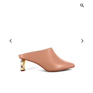 Shu Shop pumps never worn size 10